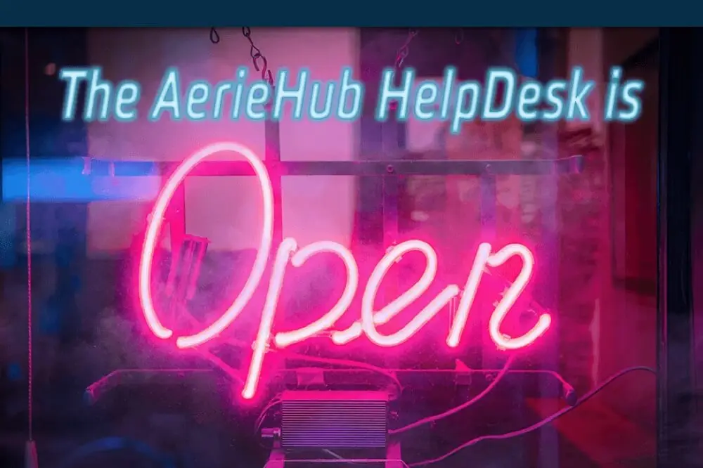 a neon sign that reads Open and the text above it that says the AerieHub helpdesk is