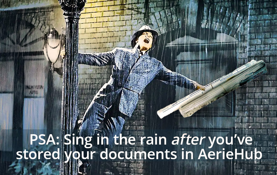 Vintage movie still of a man singing in the rain holding architectural documents.