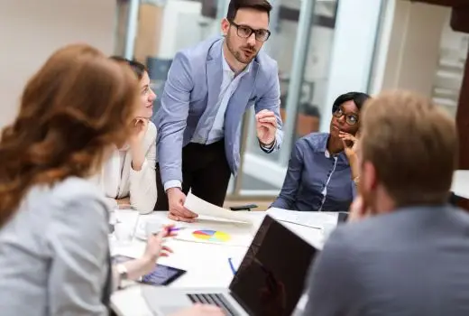 Man speaks to meeting of government officials