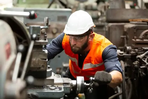 Man works at a machine